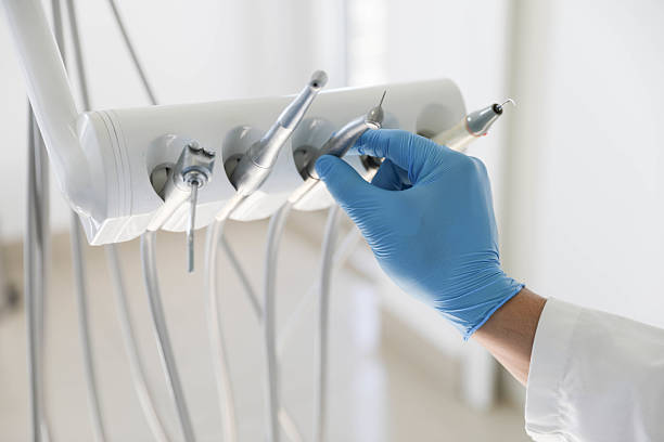 Professional Emergency Dentist technician working in Greentree, NJ